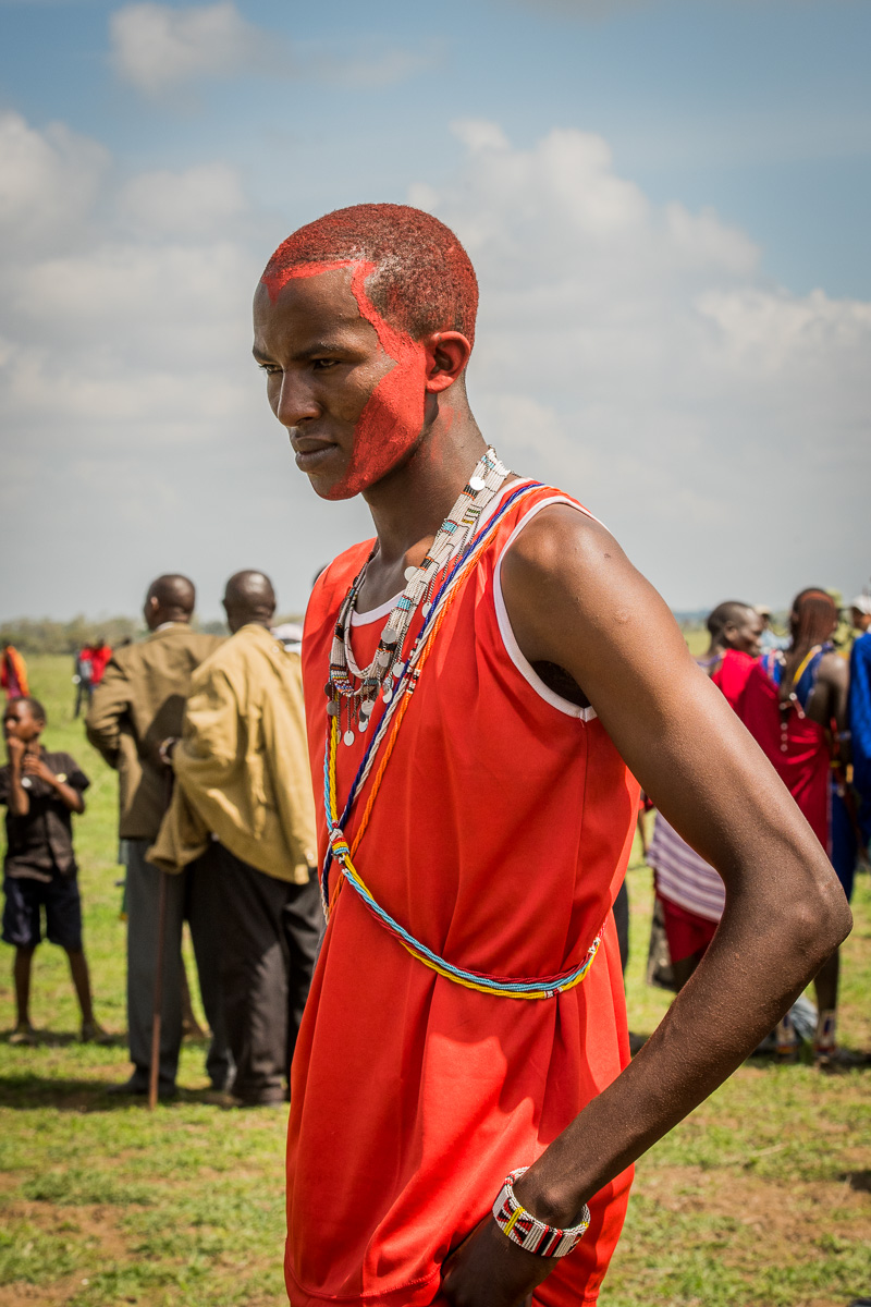 Prior to the contests, this moran undoubtedly spent hours painting his head & face with ocher paint in the traditional Maasai style.